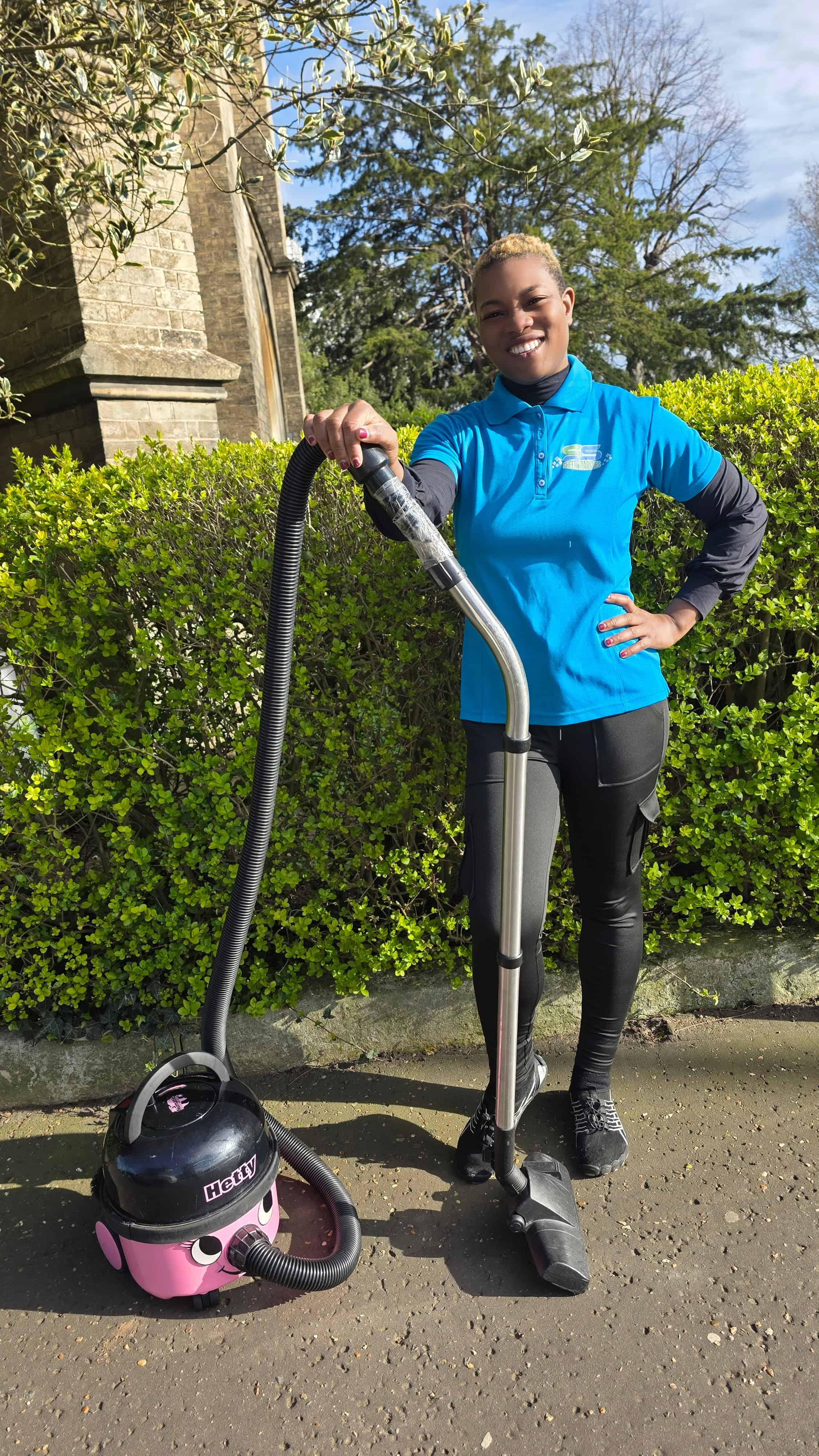 Crystal, Founder of Sheer Sparkles Ltd, with her cleaning equipment